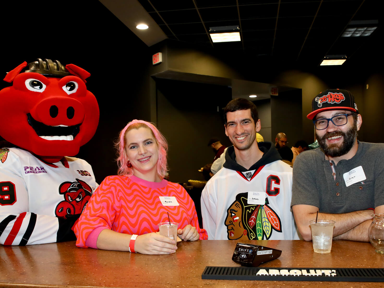 IceHogs mascot Hammy posing with Rockford residents