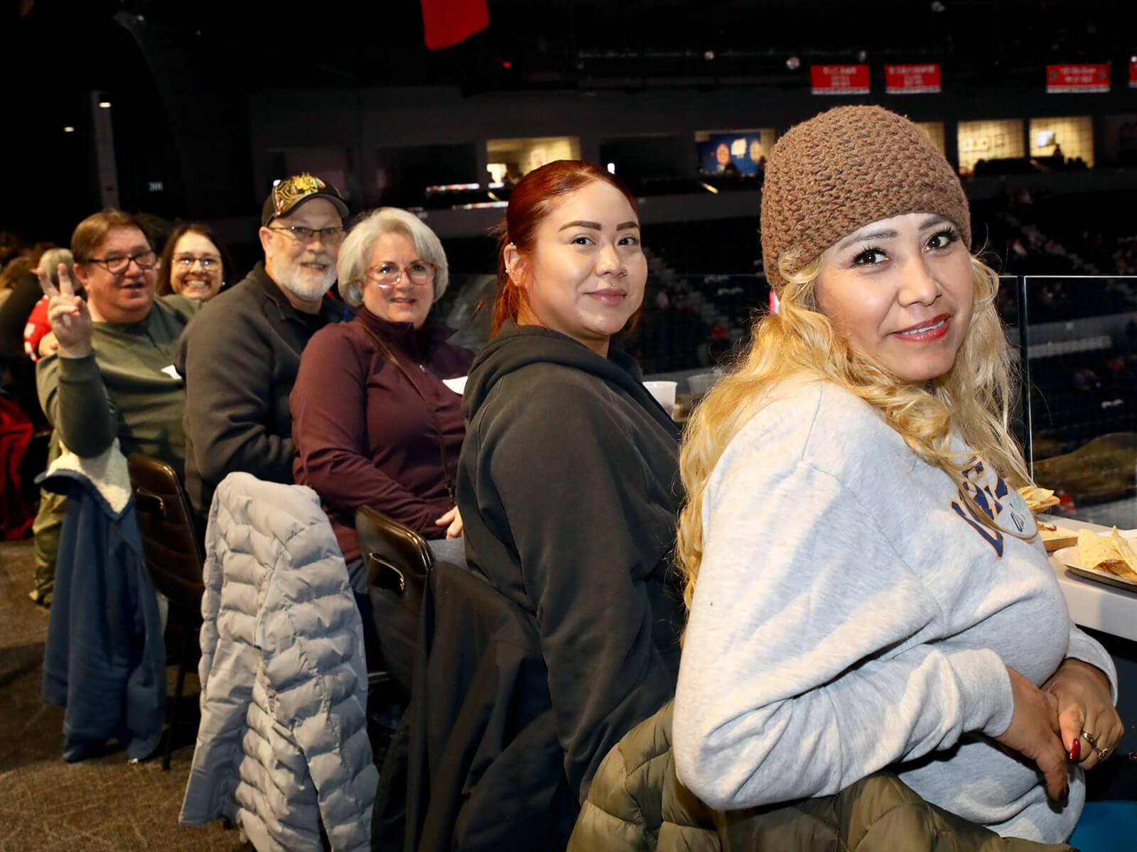 Rockford residents sitting in the BMO Center Rooftop Suite