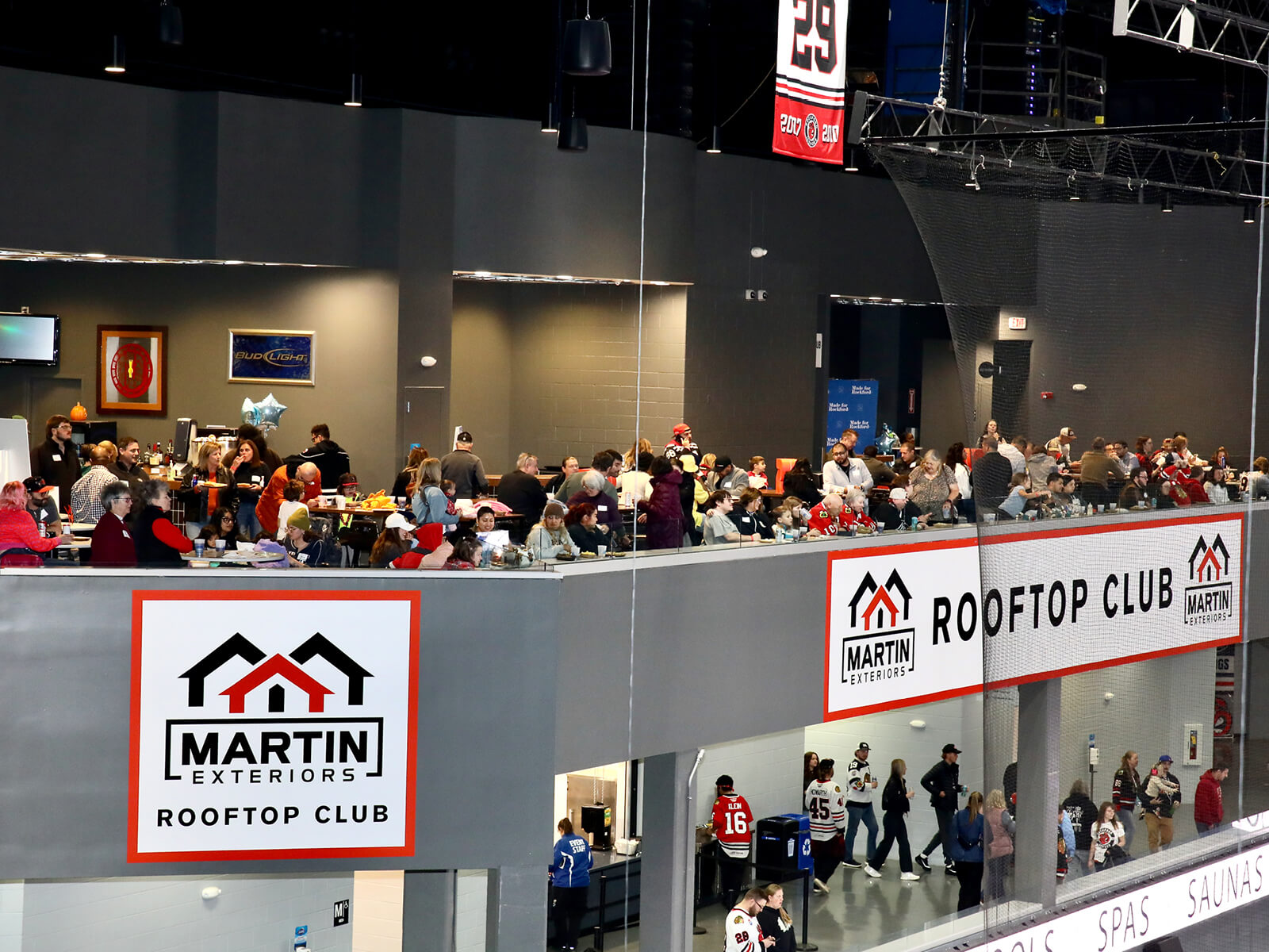 People sitting in the BMO Center Rooftop Suite
