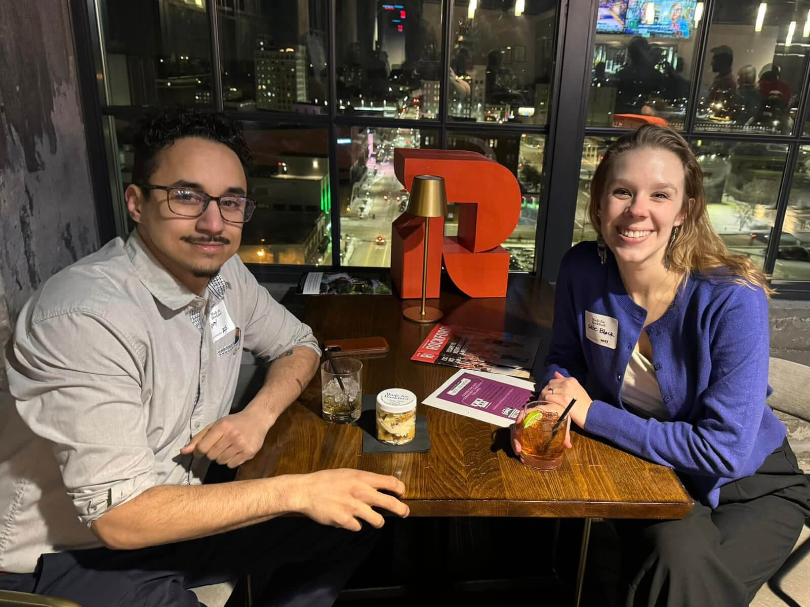 Two Rockford residents sitting and drinking at Embassy Suites