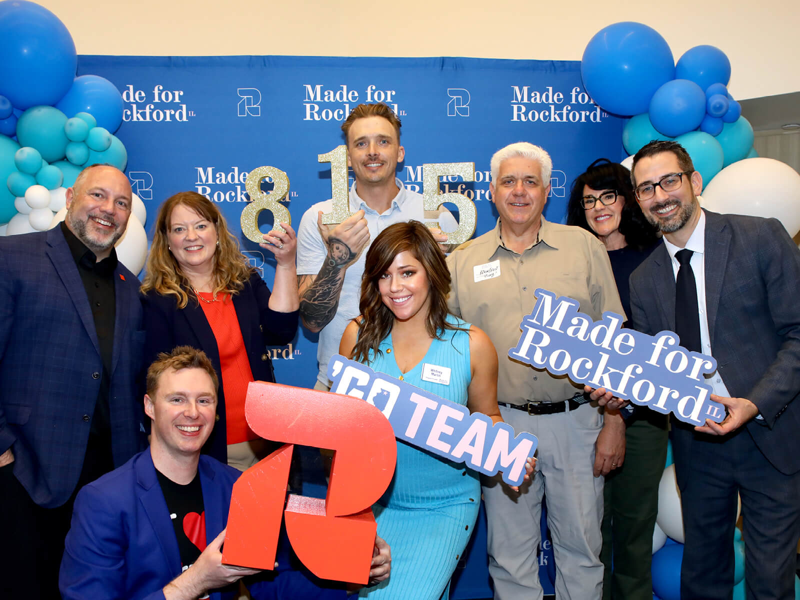 Rockford residents pose at a Made for Rockford mixer
