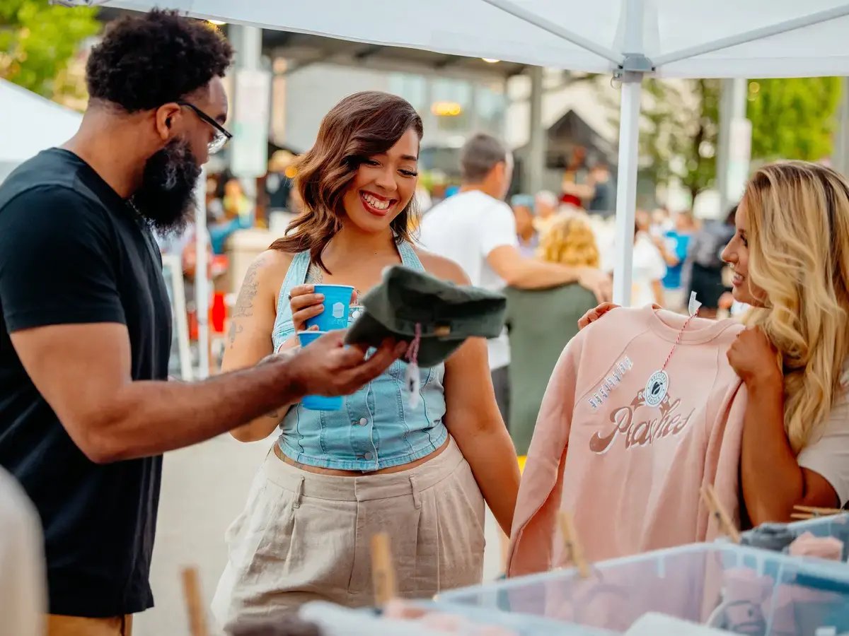Friends browsing at Rockford City Market